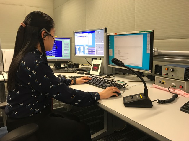 Aeronautical Communications Officer broadcasts meteorological information to aircraft in flight