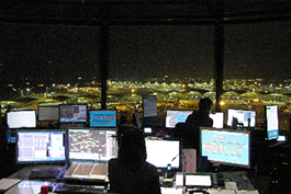 Air Traffic Controllers directing aircraft around the clock from the Control Tower