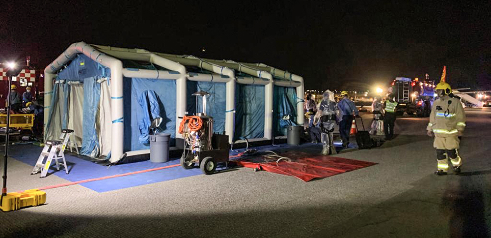 On-site decontamination procedures for passengers were simulated during the full-scale aircraft crash exercise conducted in November 2020.
